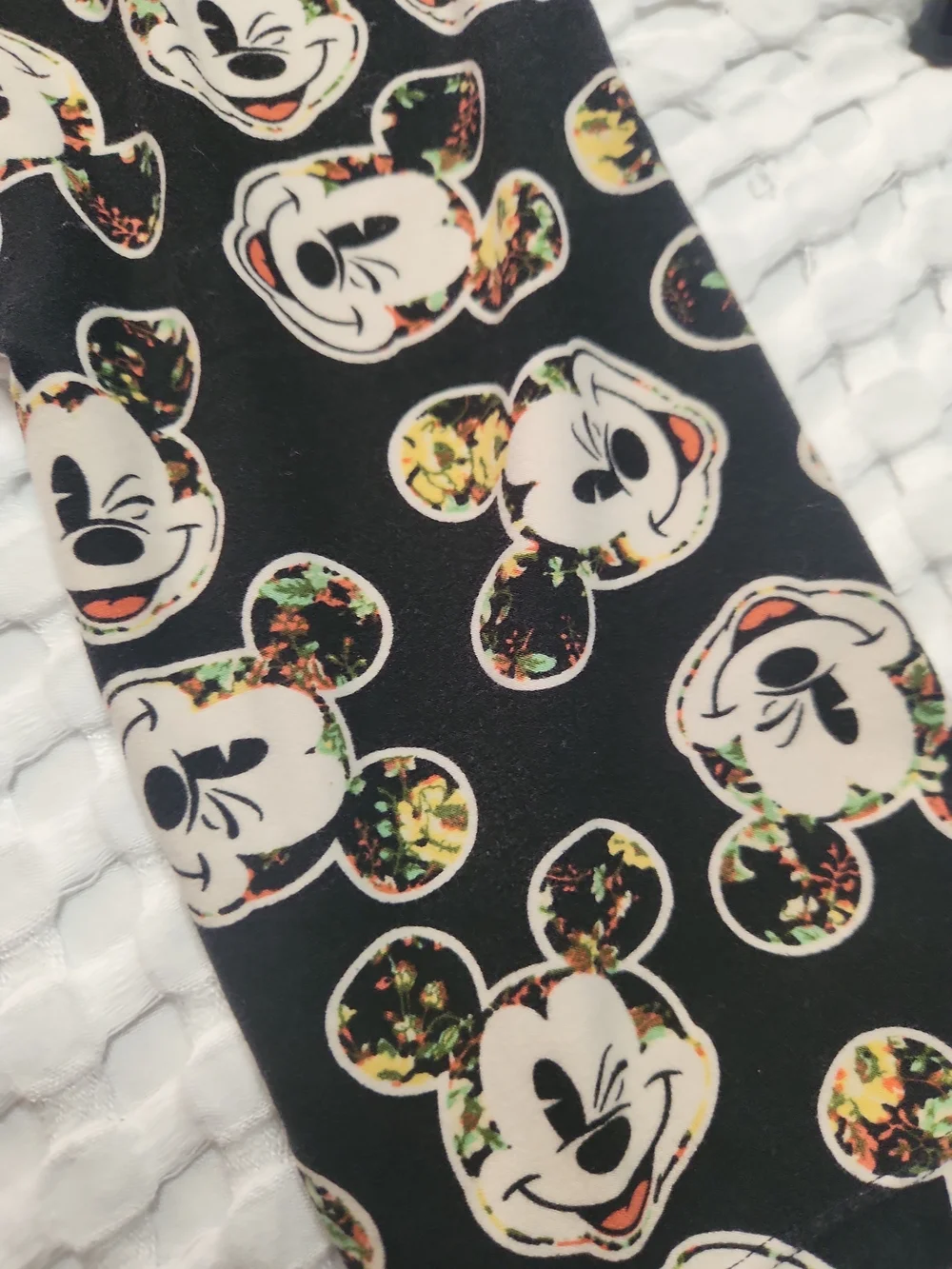 LuLaRoe Black Skinny Jeans with Cream Character Faces